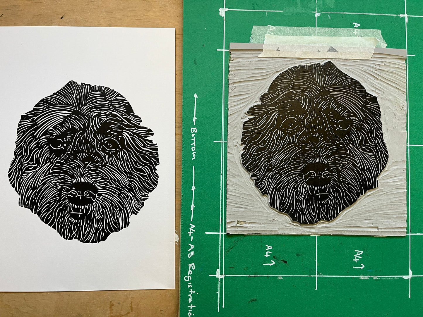 Black and white abstract design on a white sheet of paper, with a green border and measurement details.